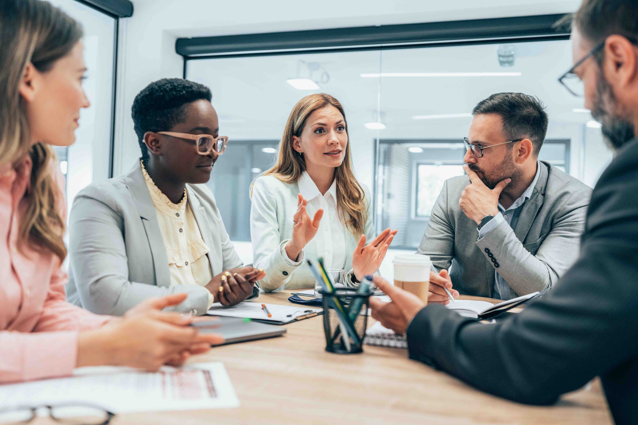 Professional team meeting in a modern office.