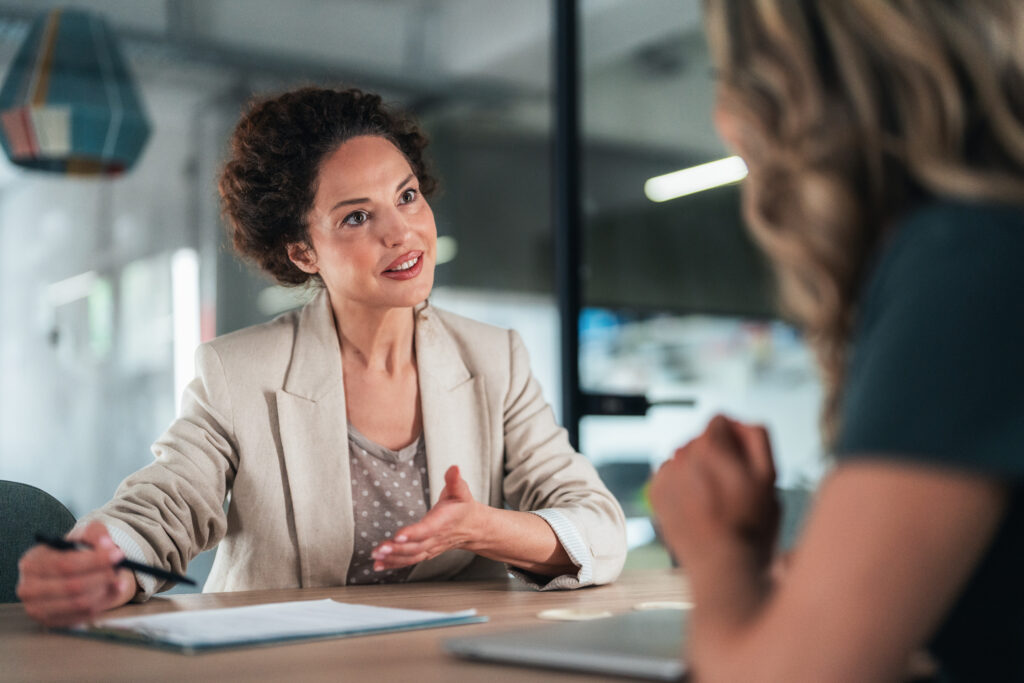Female salesperson meeting with client